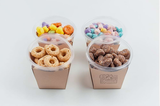 Food packaging boxes with colorful snacks display